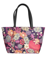 Tote bag with floral and shell pattern on a white background