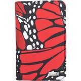 A slim passport holder featuring a printed monarch butterfly wing pattern.