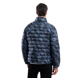 Person wearing a blue camouflage puffer jacket on a white background