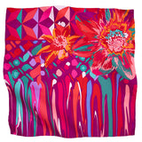 A square silk scarf featuring a vibrant abstract floral and geometric pattern.