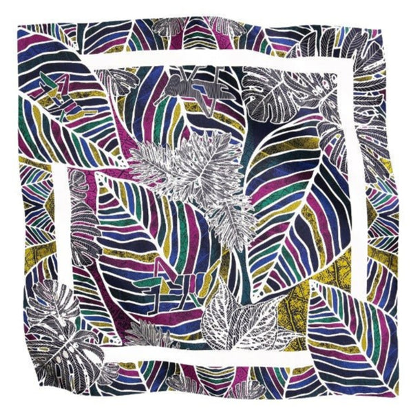 Colorful leaf patterned scarf on a white background